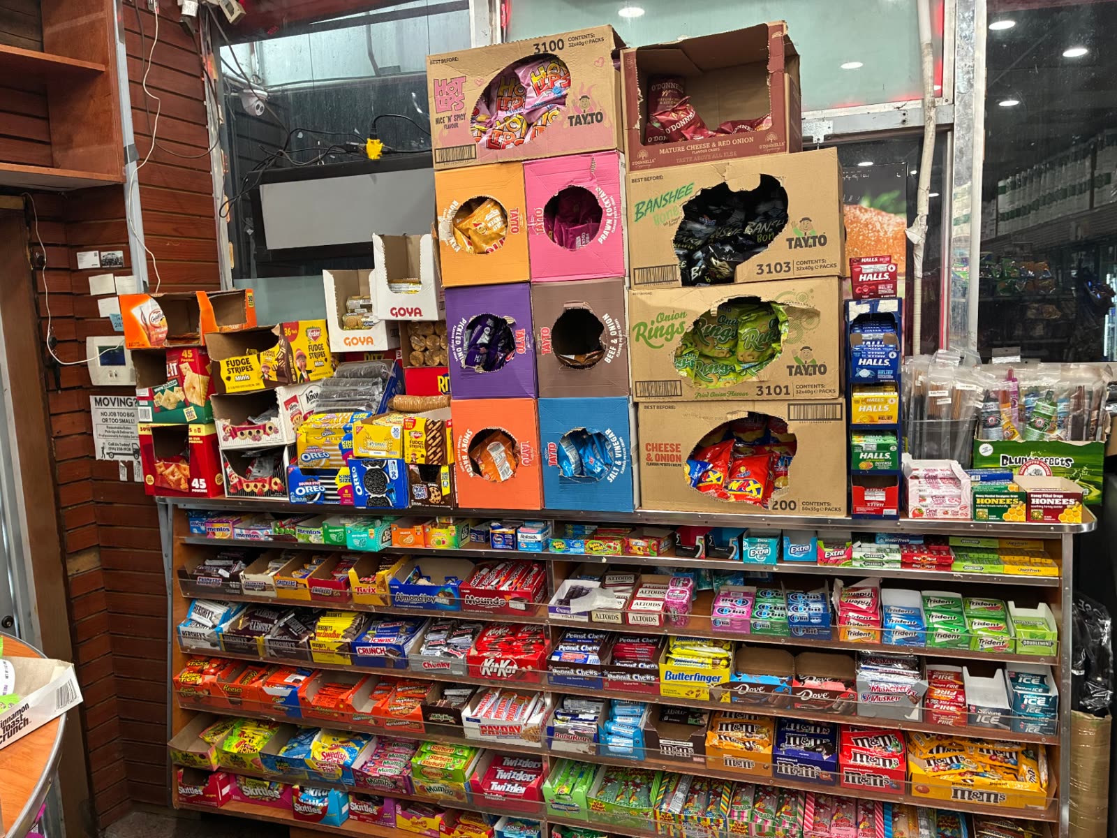 Candy and gum counter display inside The Famous Deli